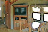 Dining area of the Dogwood Acres fifth wheel rental trailer.