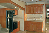 Kitchen area of the Dogwood Acres fifth wheel rental trailer.