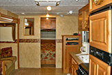 Kitchen and dining area of the Dogwood Acres rental trailer.