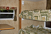 Rear bedroom of the Dogwood Acres rental trailer.